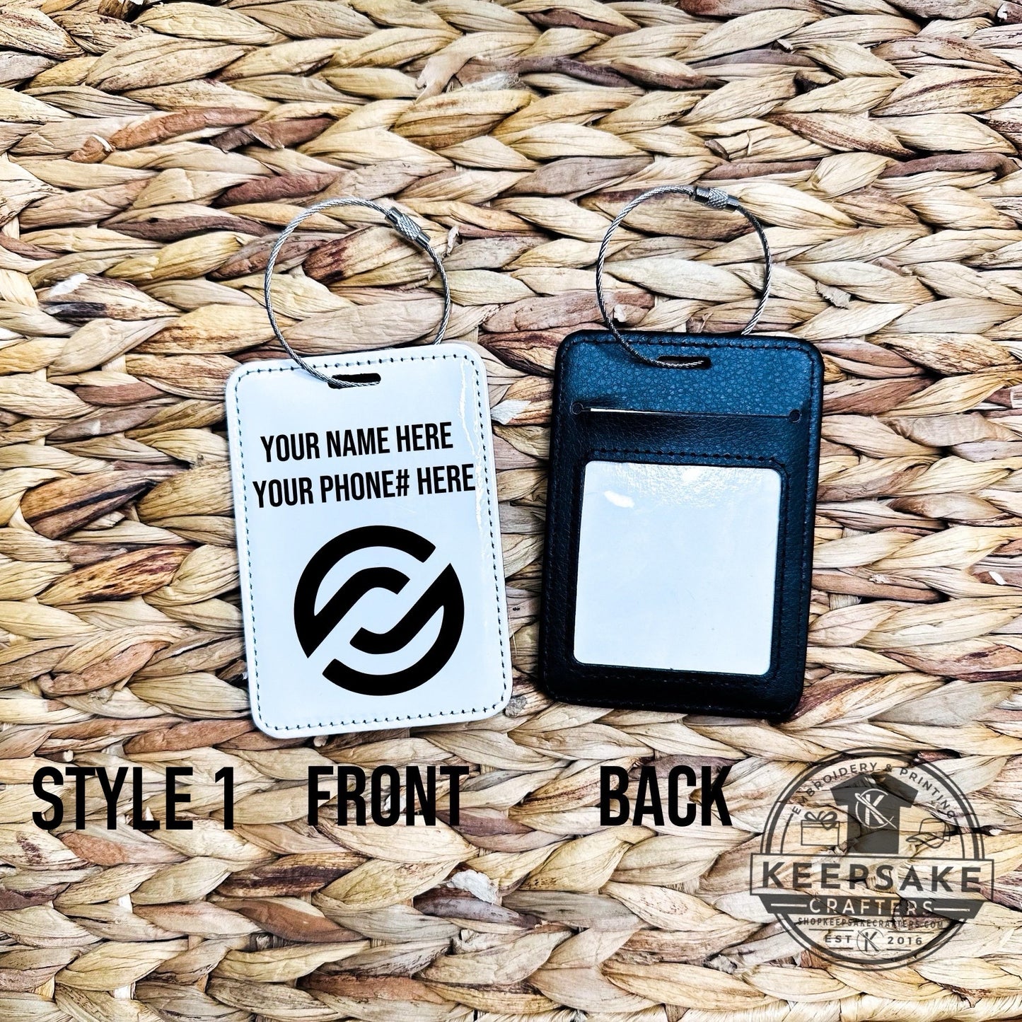 A front and back view of a white luggage tag with a logo and space for contact information, displayed on a woven background.