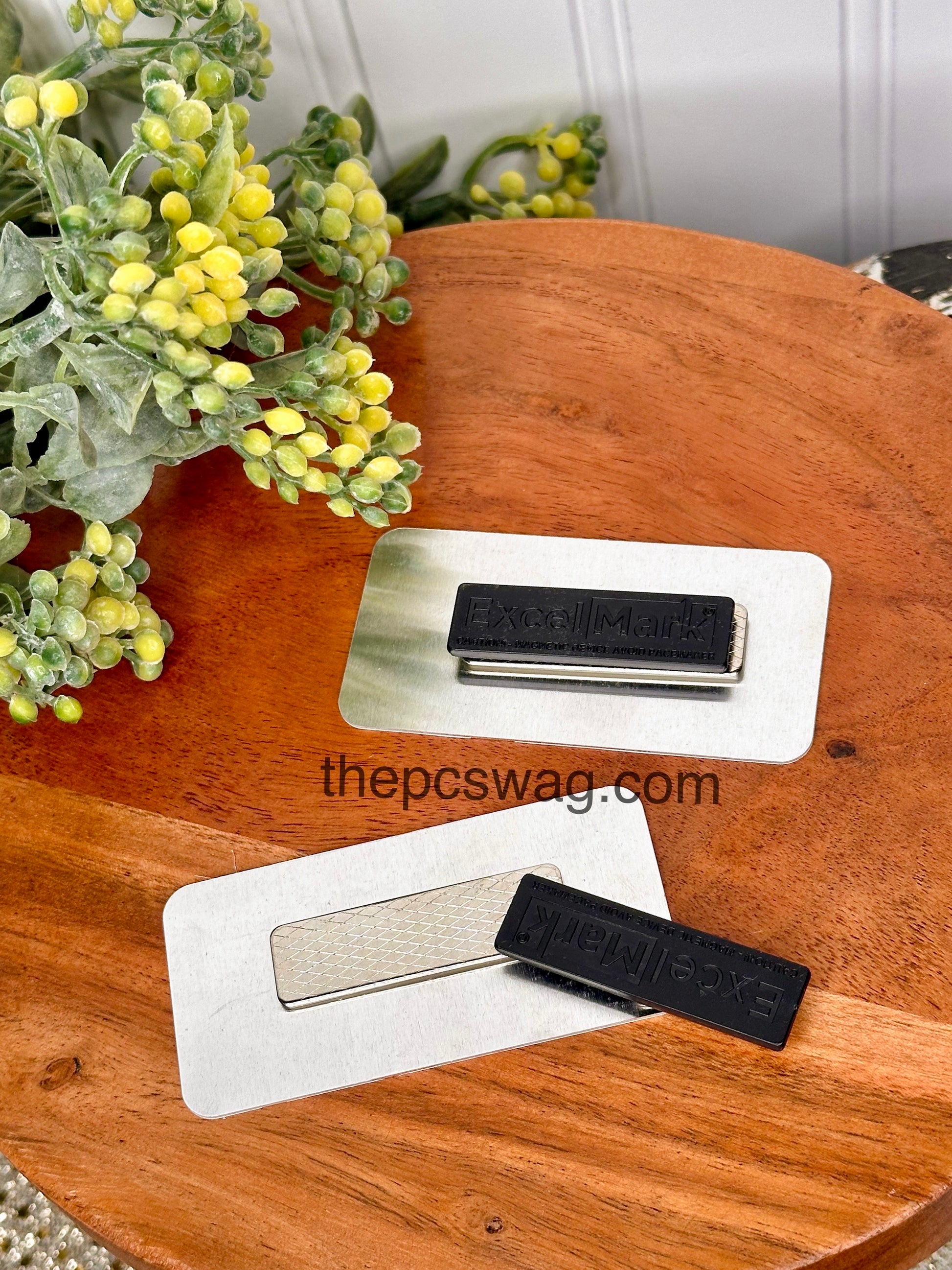 Durable metal name tag with printed name and strong magnetic backing, fade-resistant finish