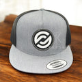 A gray flatbill cap with black mesh and a white embroidered design on the front.