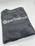 A gray camouflage pattern performance tee with the text 'partner.co' printed on the front.