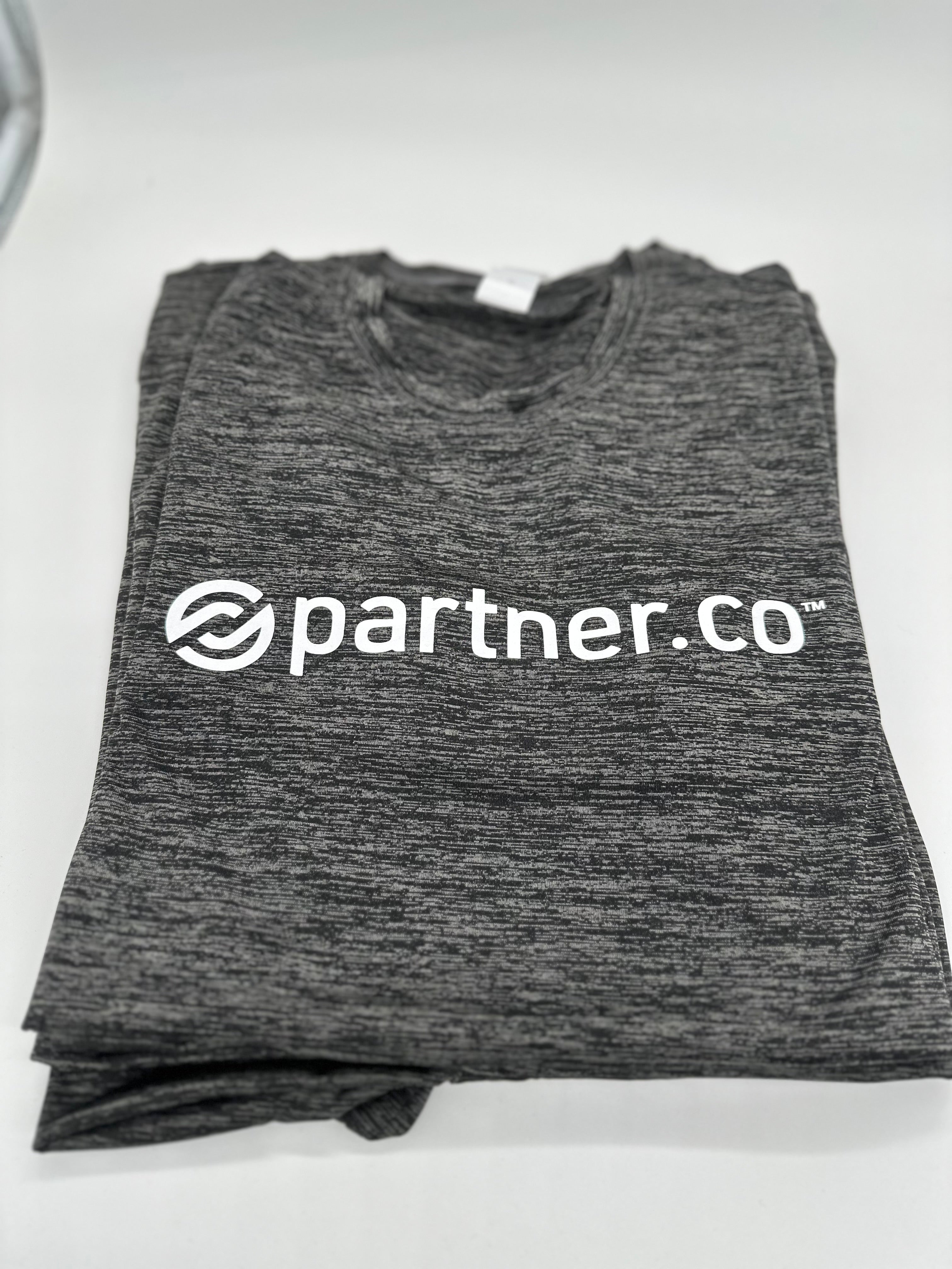A gray t-shirt with the text 'partner.co' printed on the front.