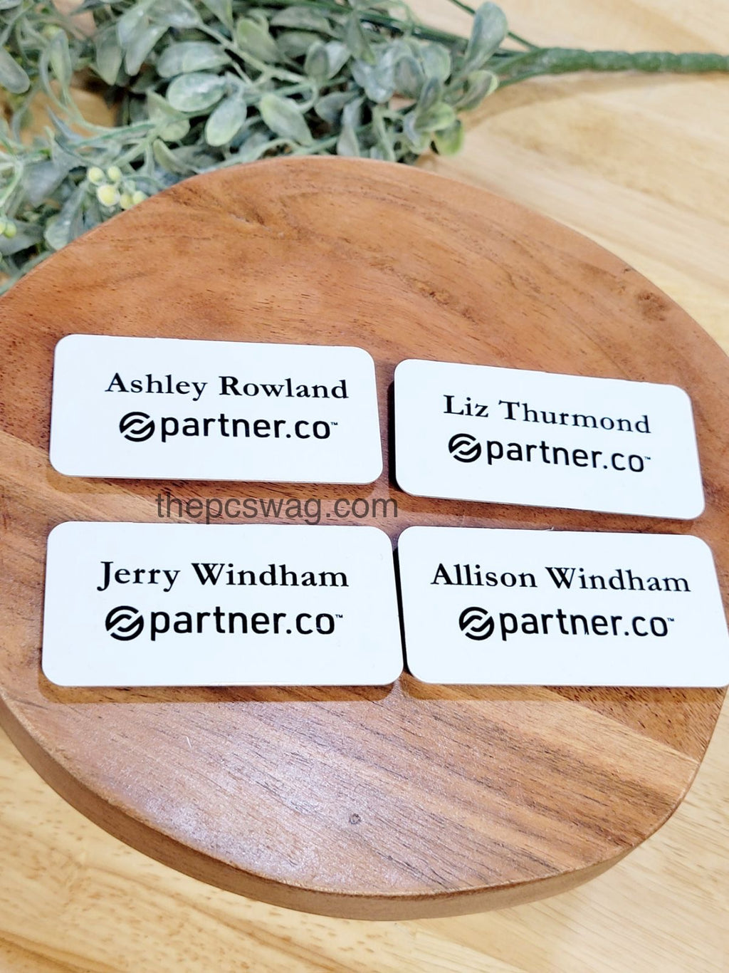 Durable metal name tag with printed name and strong magnetic backing, fade-resistant finish