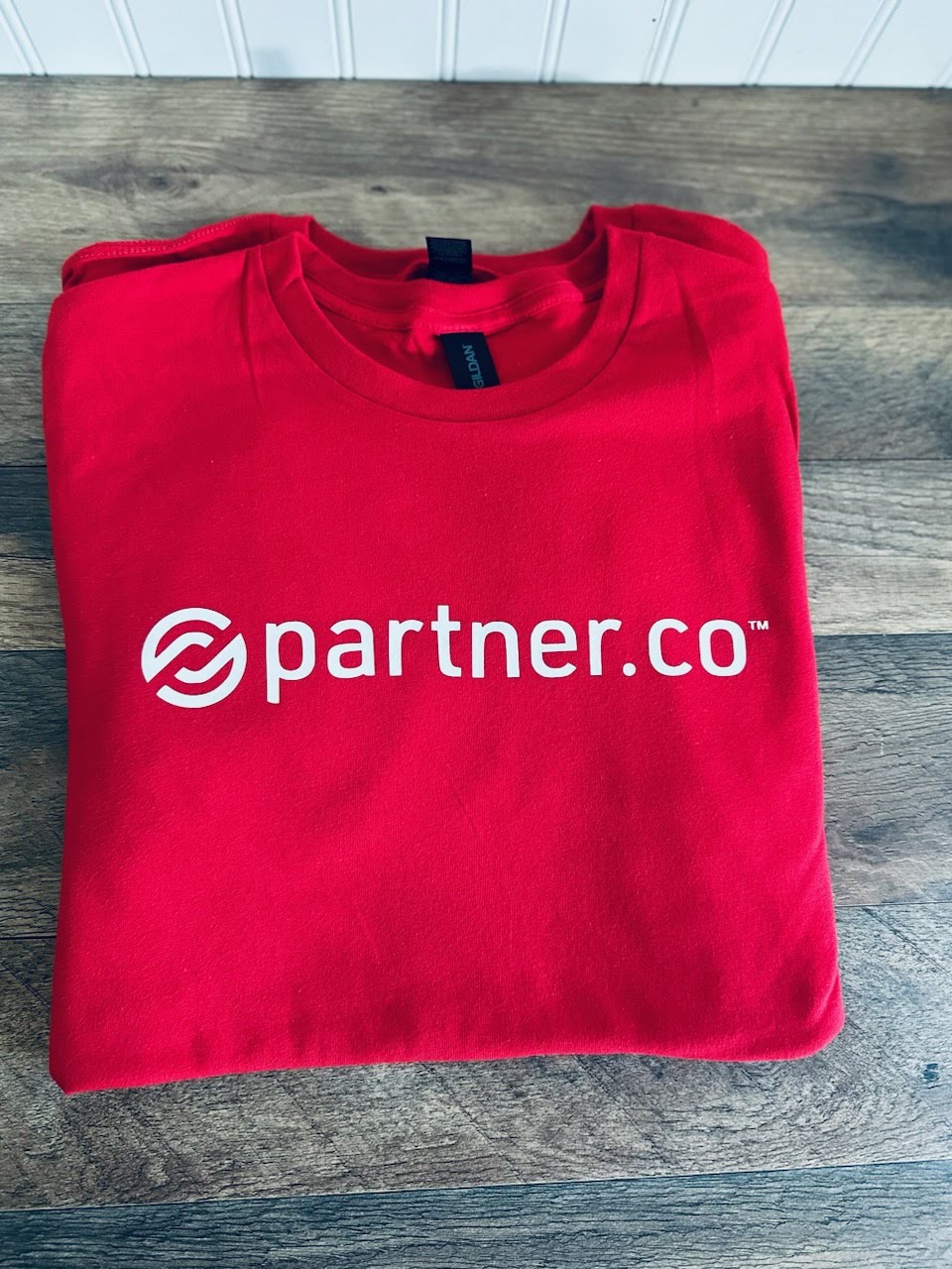 Unisex Partner.Co long sleeve swag t-shirt in soft breathable fabric,